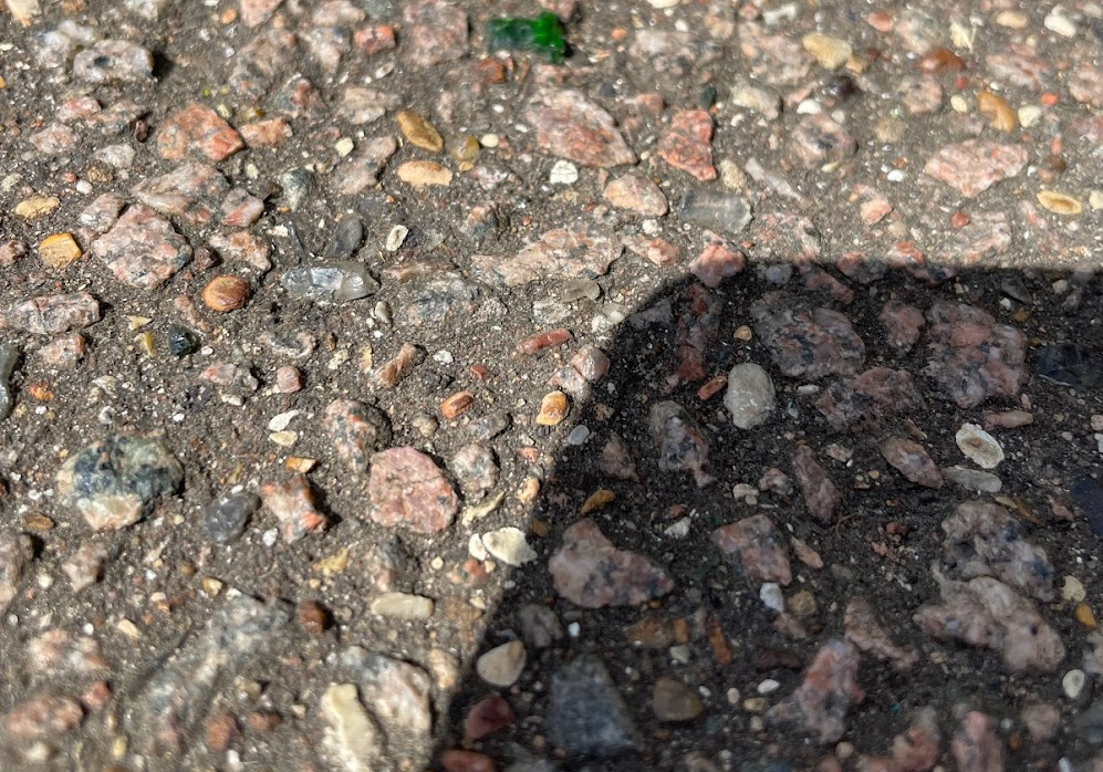Rough tarmac surface at Donkey Common